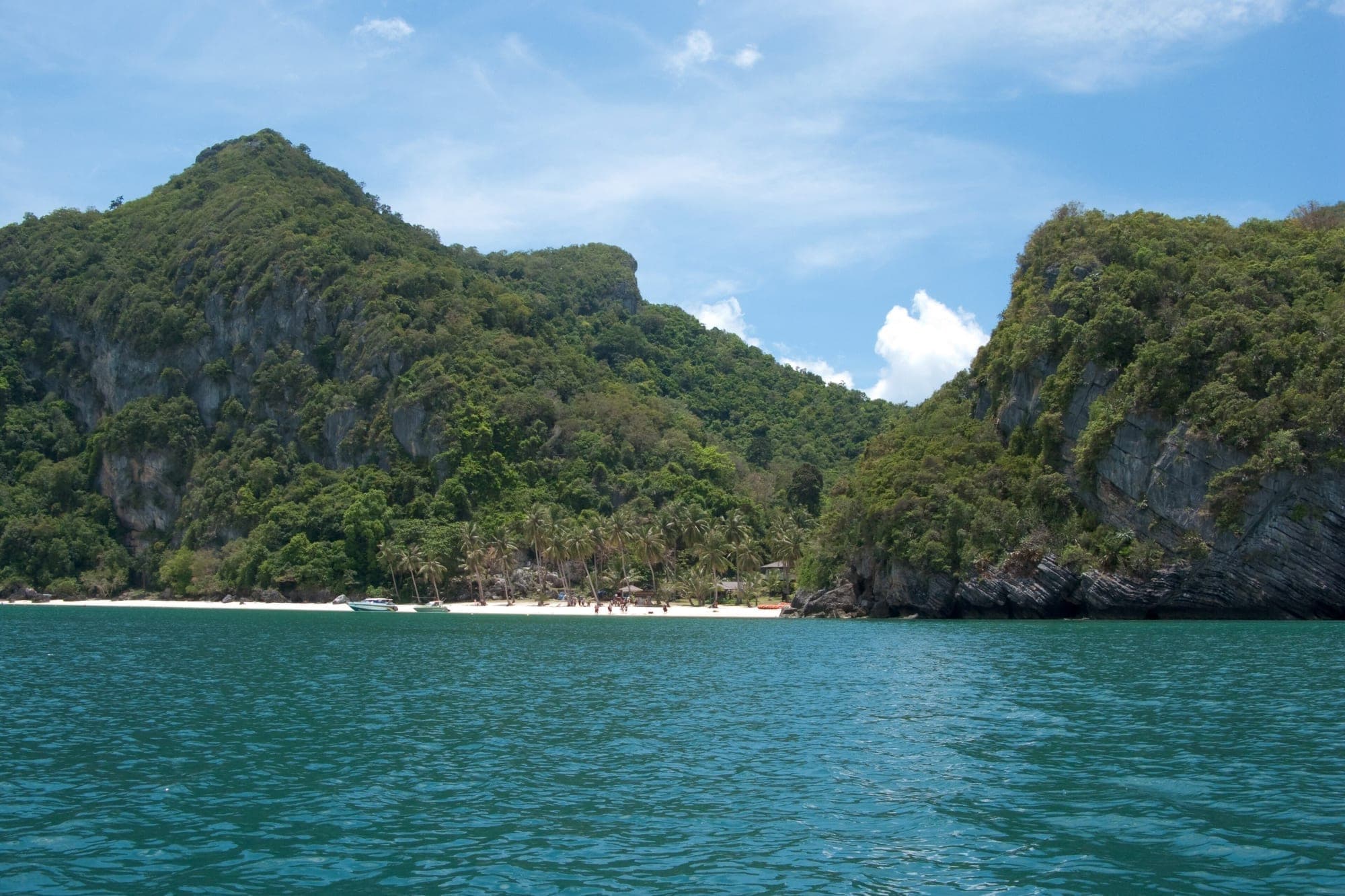 Green islands in a turquoise sea in southern Thailand