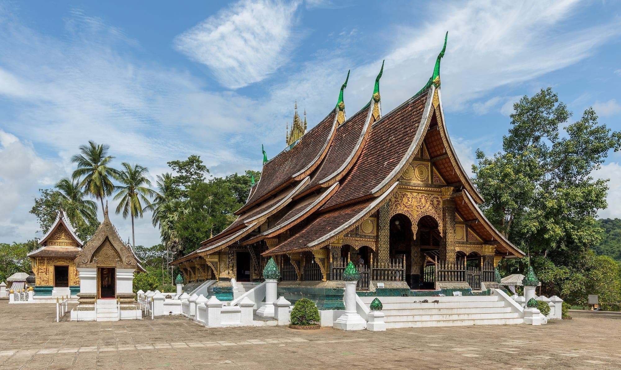 The tiered roofs of Wat Xieng Thong temple in Luang Prabang