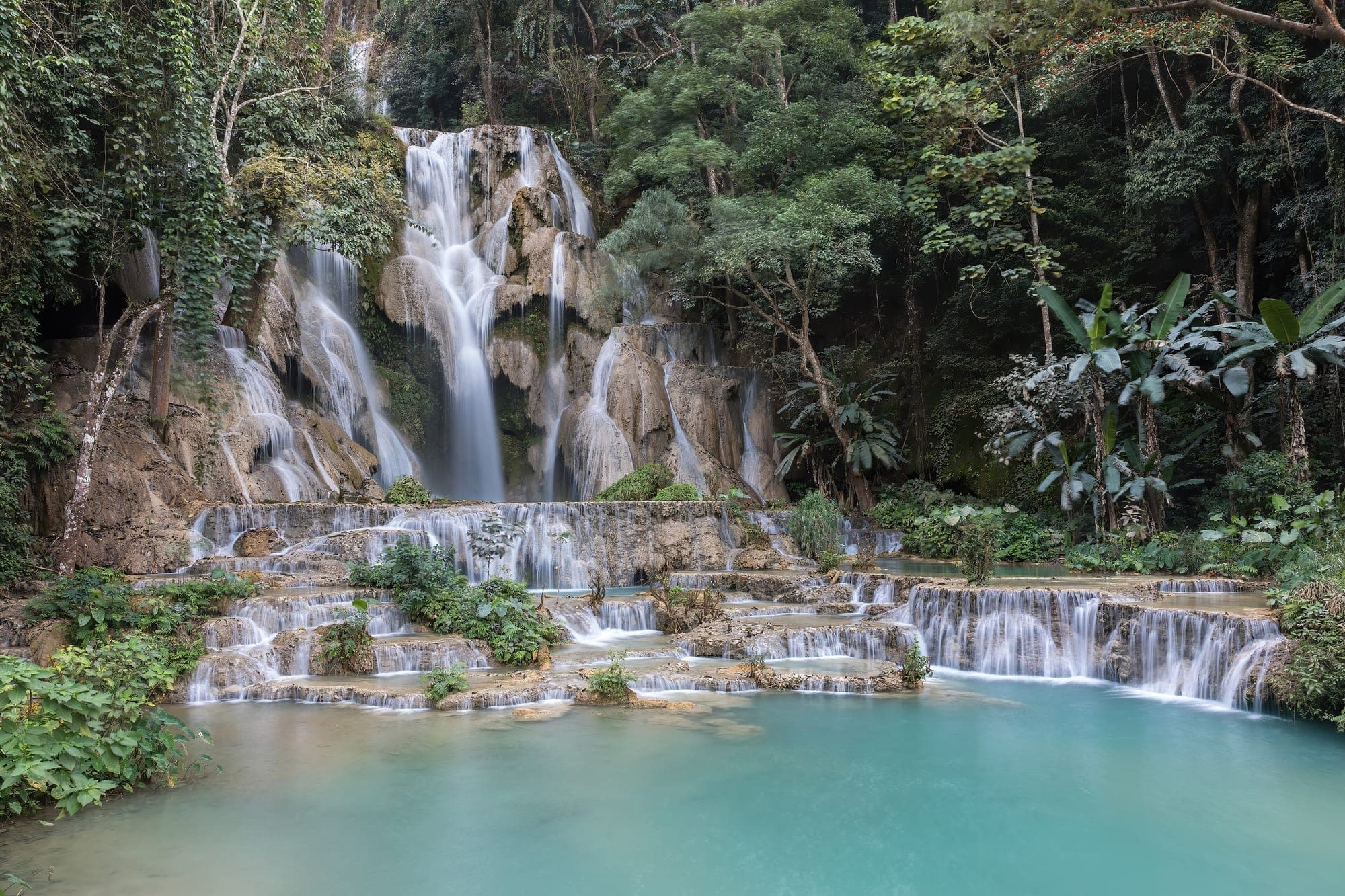 Turquoise cascades at Kuang Si Falls